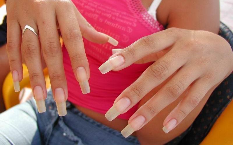 Long, manicured nails are a fashion statement.